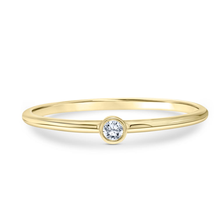 Stackable Solitaire Diamond Ring set in 14k Yellow Gold