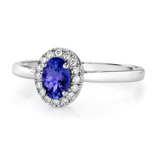 Load image into Gallery viewer, Oval Shaped Tanzanite &amp; Diamond Halo Ring set in 925 Silver
