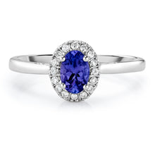 Load image into Gallery viewer, Oval Shaped Tanzanite &amp; Diamond Halo Ring set in 925 Silver
